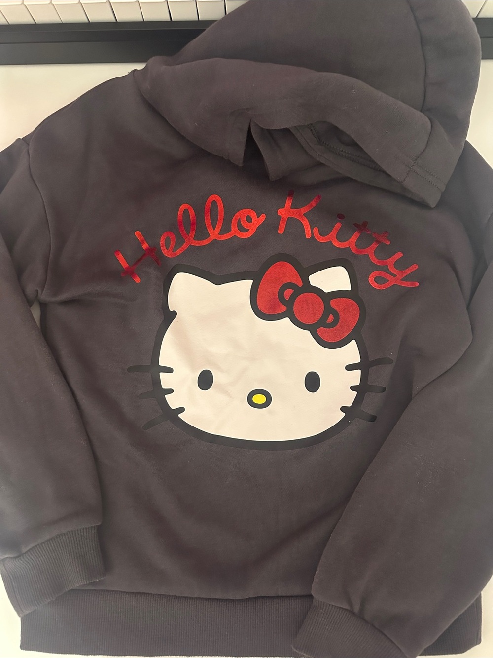 Hello Kitty Black Pullover Hoodie with Red Bow